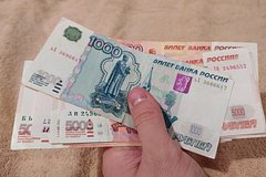 Назван порядок действий при получении фальшивой купюры